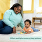 Winnie the Pooh stroller activity toy with teal rings and colorful rattle pieces on carpet