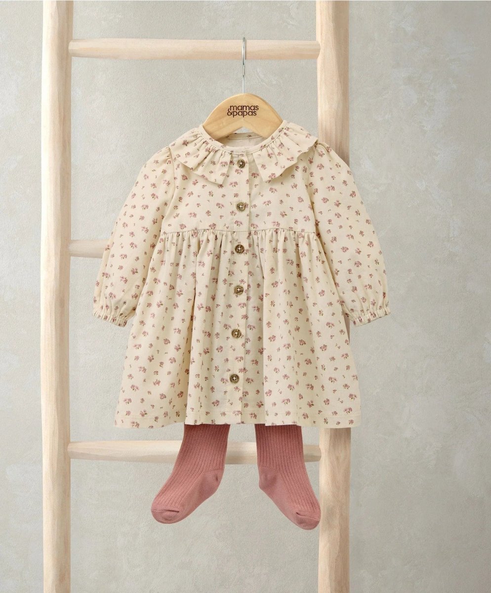 Cream ditsy rose dress with long sleeves, buttons, and pink tights set