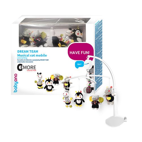 Musical cot mobile with penguin and animal dangling charms on a white stand