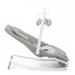 Gray baby rocker-bouncer seat with white frame, reclined position and toy mobile