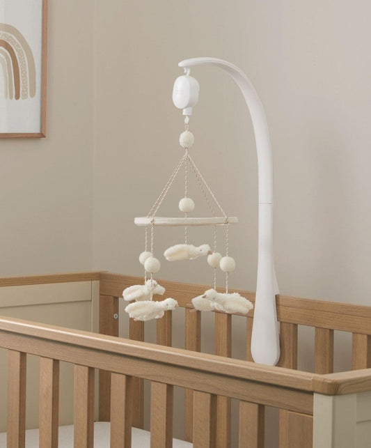 Baby crib musical mobile with white duck plush and hanging ball charms