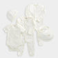 Duckling outfit set pieces: short-sleeve bodysuit, long-sleeve onesie, hat and bib