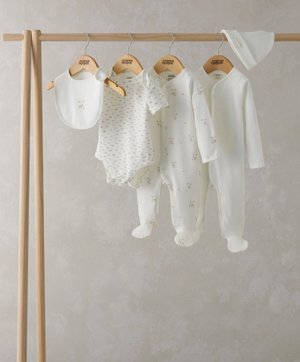 Duckling outfit set: bib, bodysuit, pants and footed romper, all in off-white