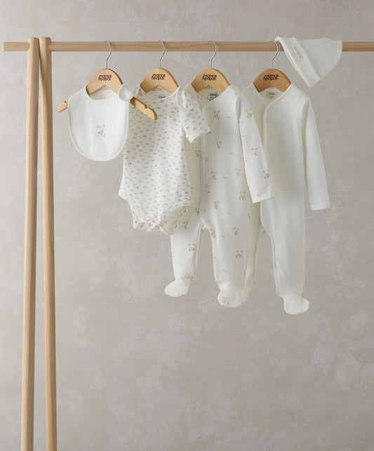 Duckling outfit set: bib, bodysuit, pants and footed romper, all in off-white
