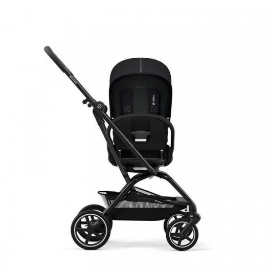 Black stroller with closed canopy and front harness, side view