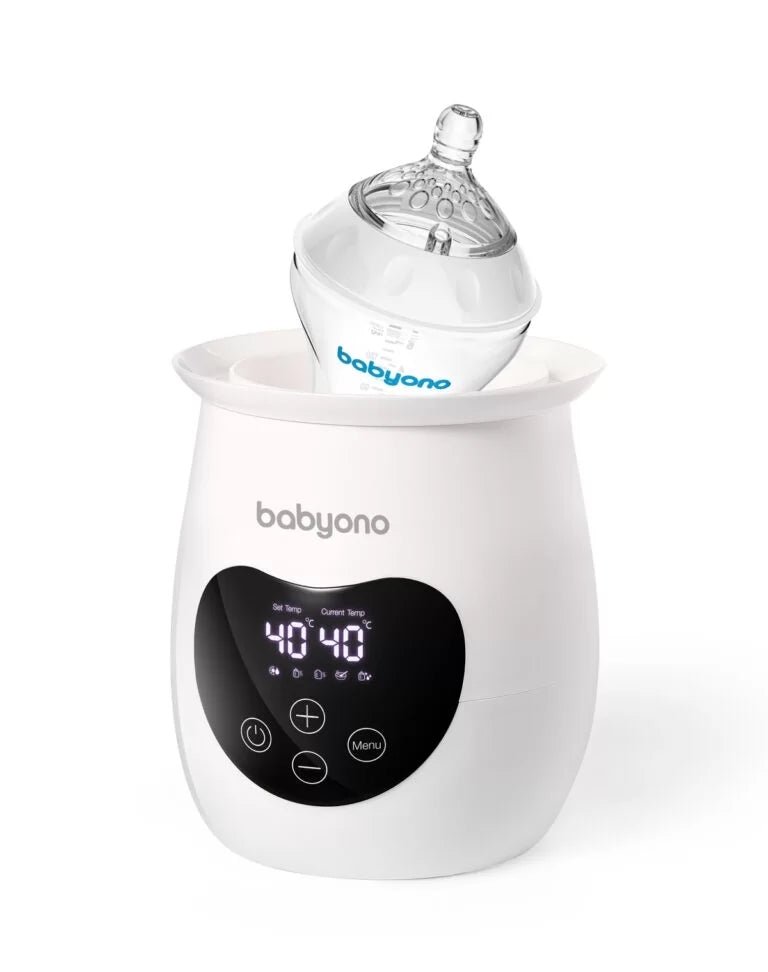 Electric food warmer and sterilizer in white with baby bottle and lid