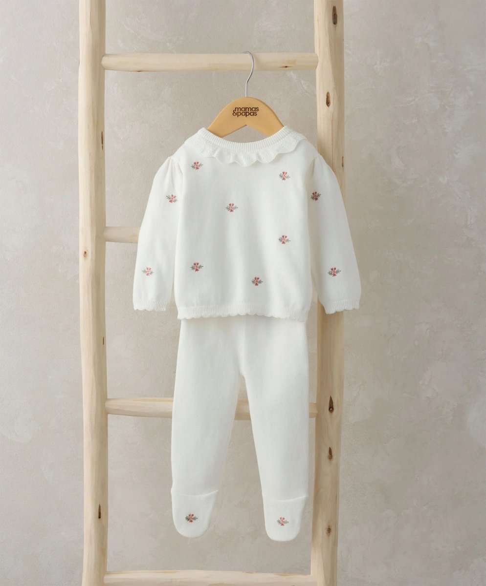 Embroidered knit outfit set in white: long-sleeve top with floral embroidery, matching pants