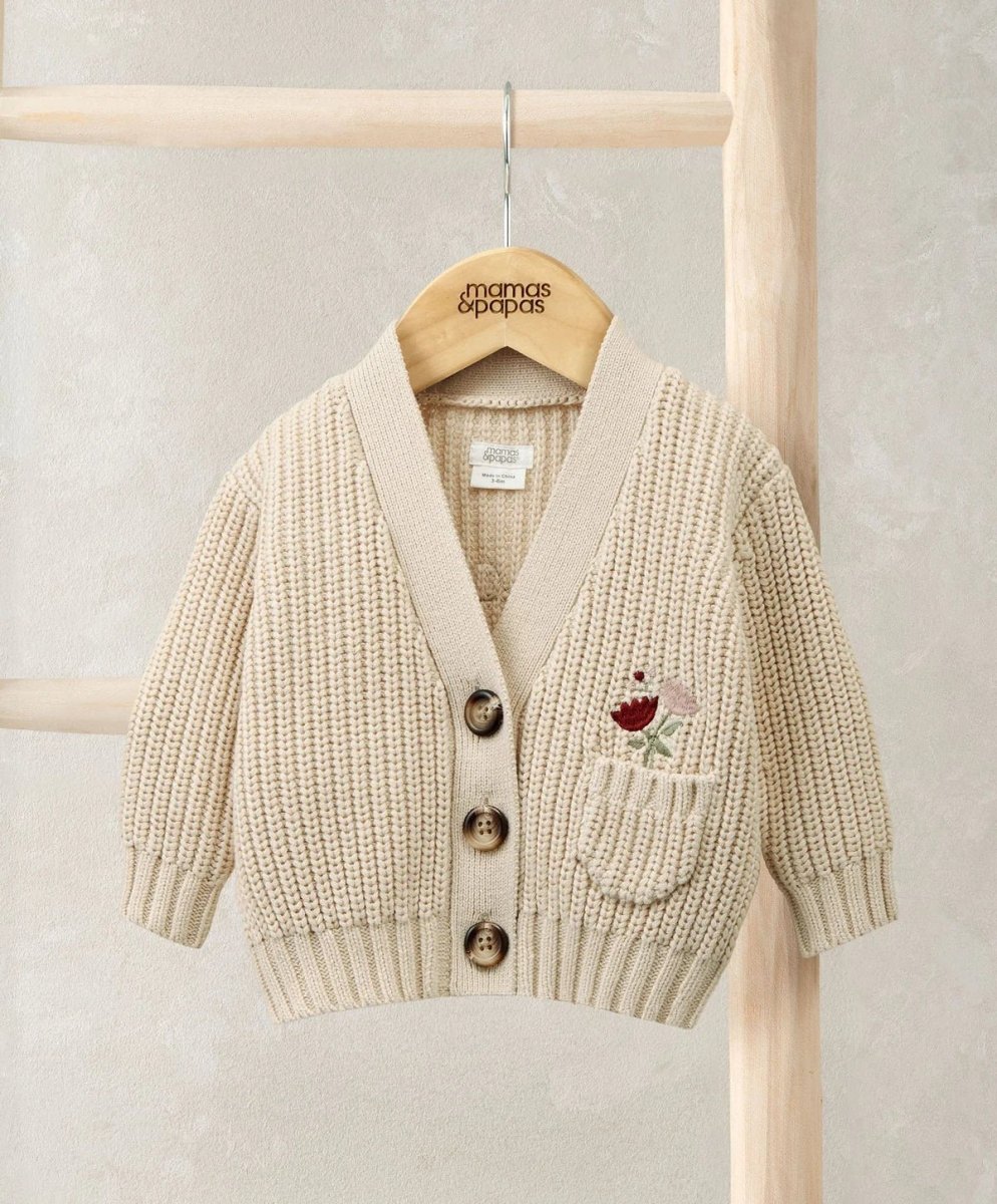 Cream knitted cardigan with button front and embroidered pocket detail