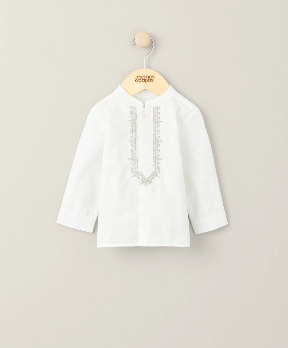 White embroidered shirt with vertical front placket and decorative trim, 3/4 sleeves