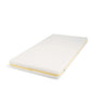 Cotbed mattress, white fibre with yellow border, angled side view