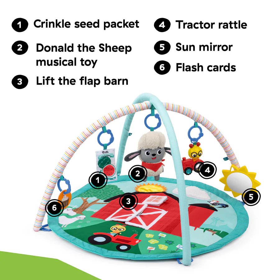 Farm activity gym play mat with hanging barn, tractor rattle, and sun mirror toys