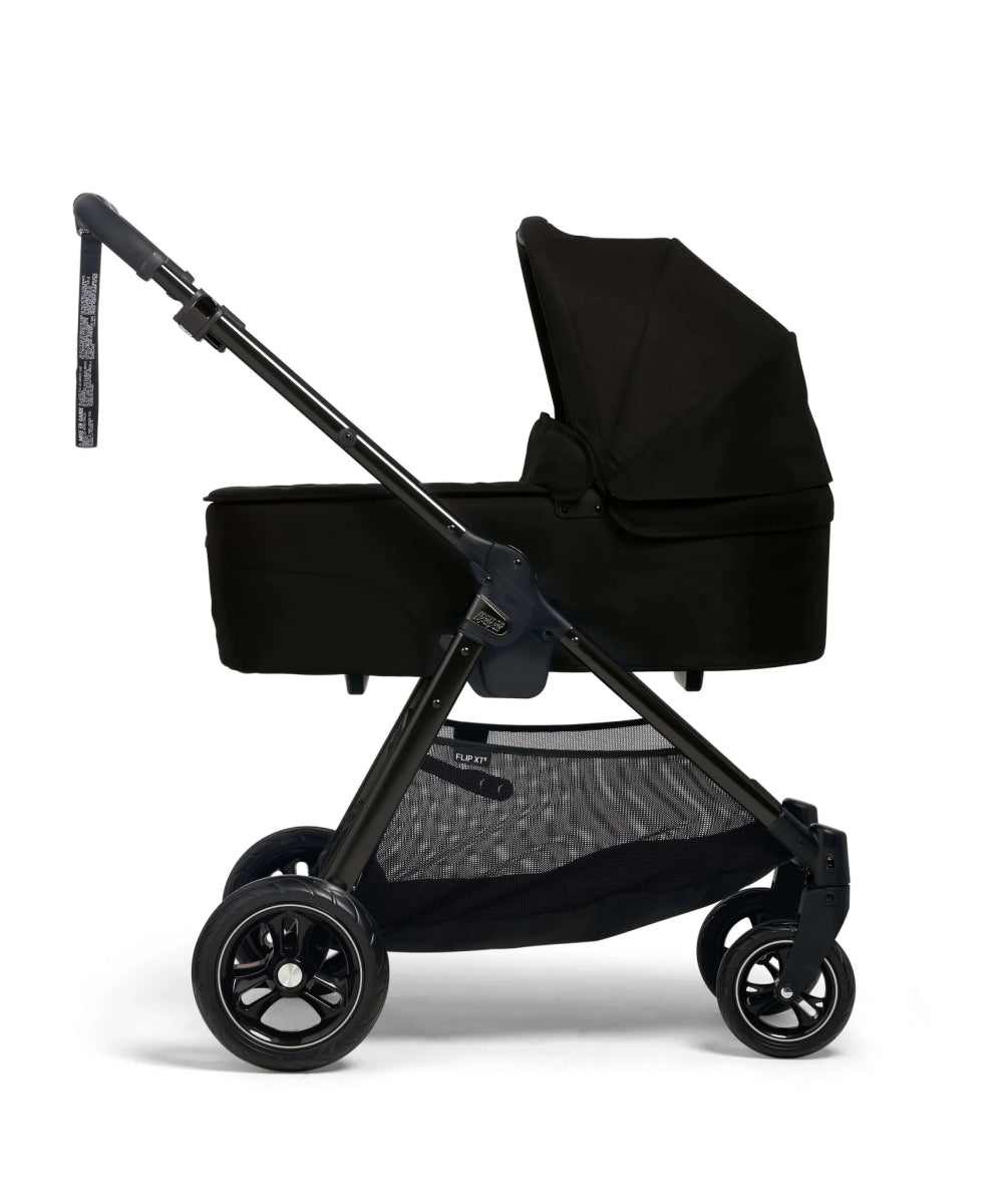 Black pushchair stroller with canopy and padded seat, side view, black wheels and silver frame