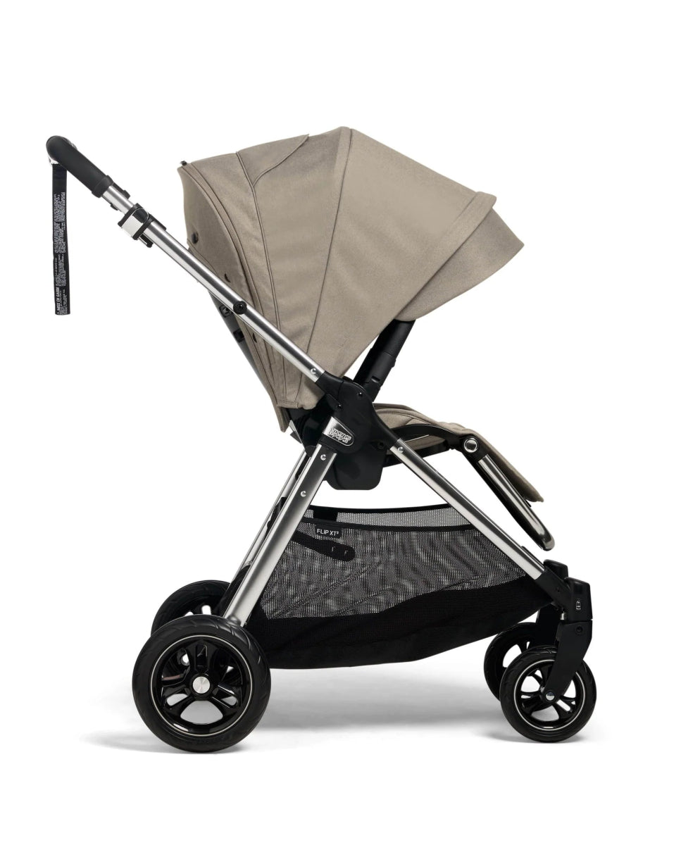 Beige pushchair with canopy and padded seat unit, three-quarter side view