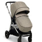 Beige pushchair with canopy, padded seat, and black undercarriage, angled view