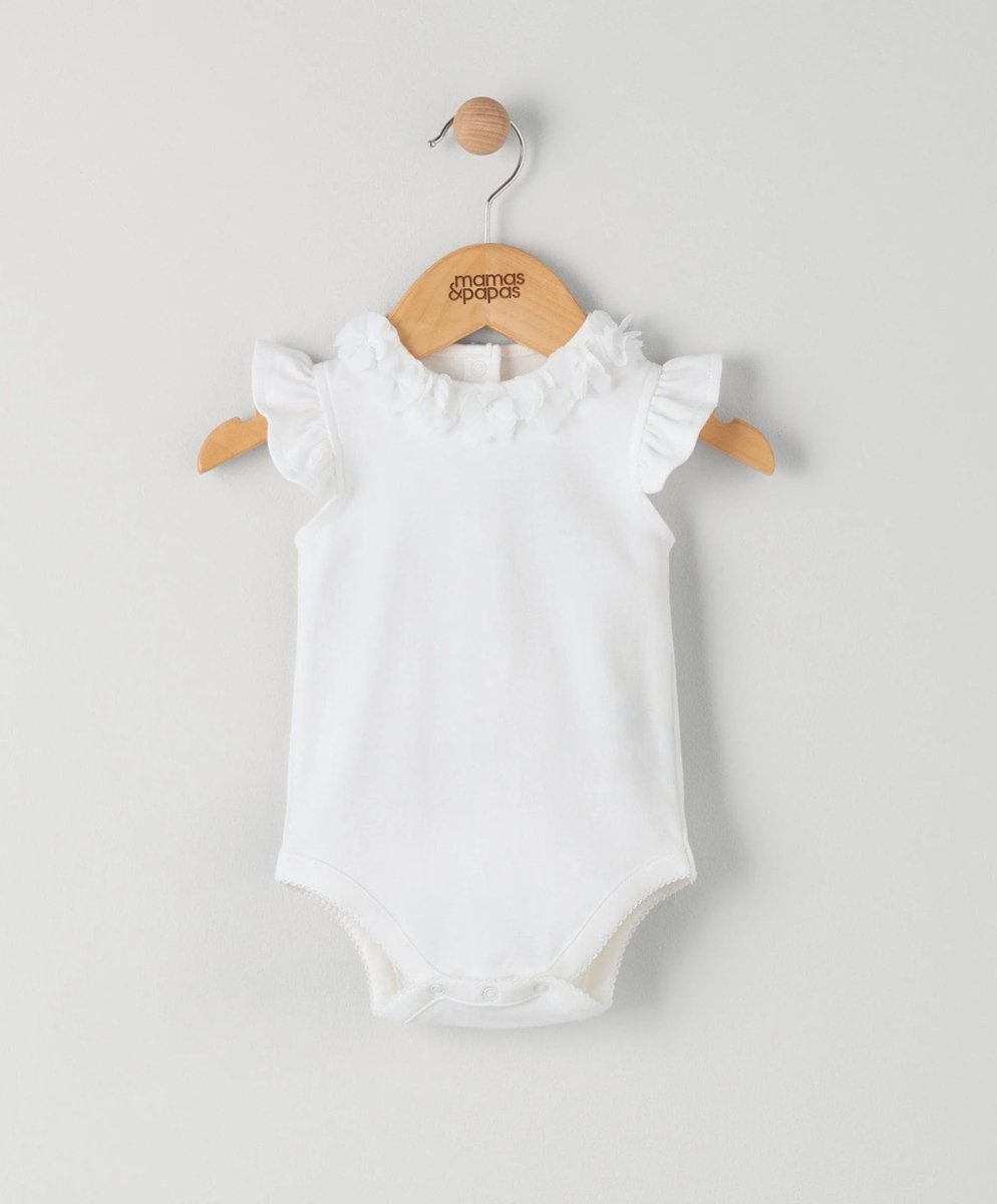 White baby bodysuit with ruffled collar and short flutter sleeves, snap crotch