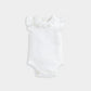 White short-sleeve baby bodysuit with ruffled neckline and snap leg closure