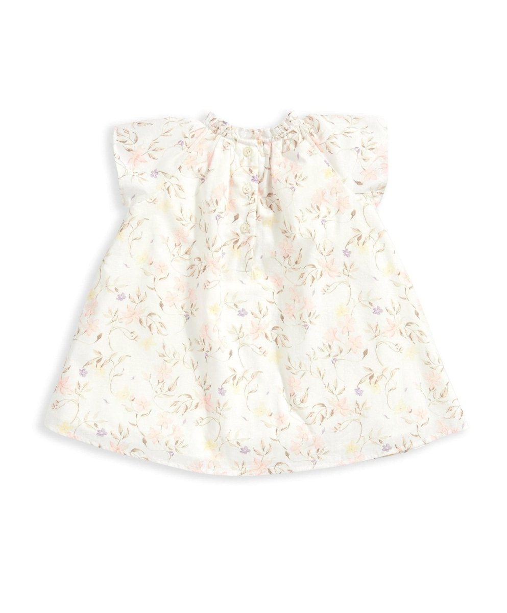 Floral print baby dress in light cream with gathered neckline and short sleeves