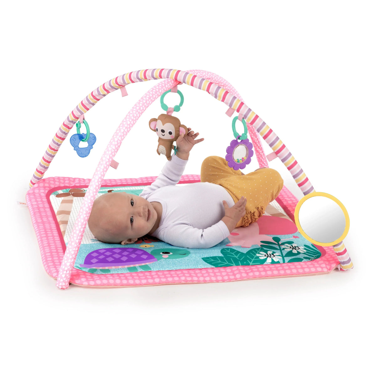 Safari activity gym mat with pink striped arch and hanging toy rings over animal print
