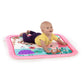 Safari activity gym mat with pink border and jungle animals under a baby in yellow outfit