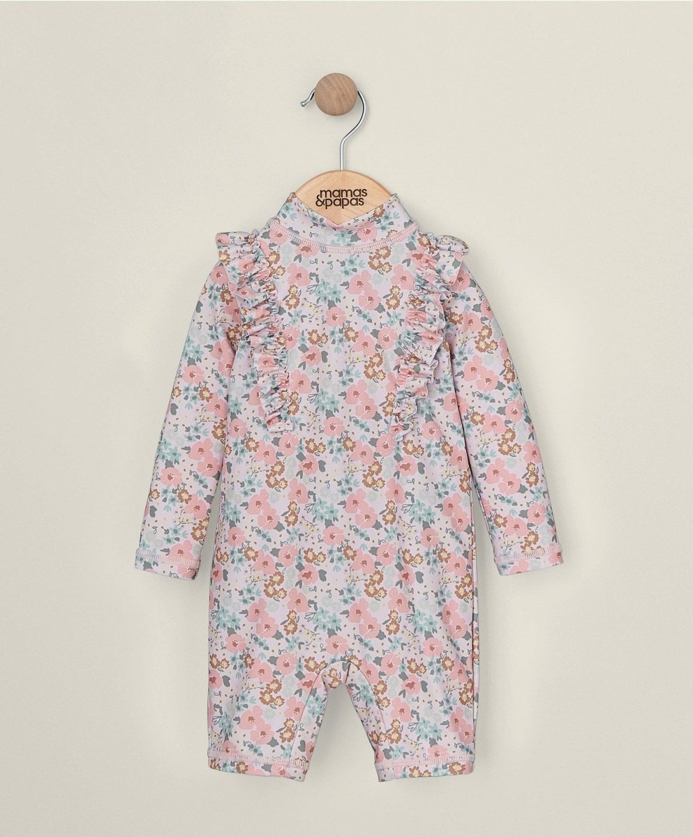 Floral rashsuit with long sleeves, high neck, light blue and pink flower print