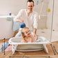 Foldable baby bathtub with size markings: 73 cm length, 45 cm height, 25.5 cm depth
