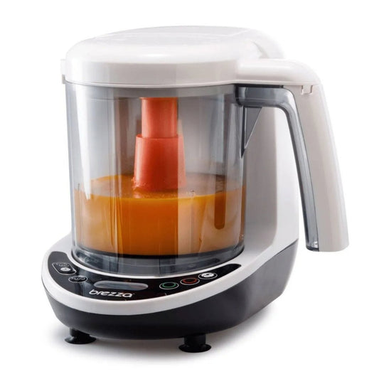 Food maker with clear jar and orange mixing cone, front appliance view on stand.