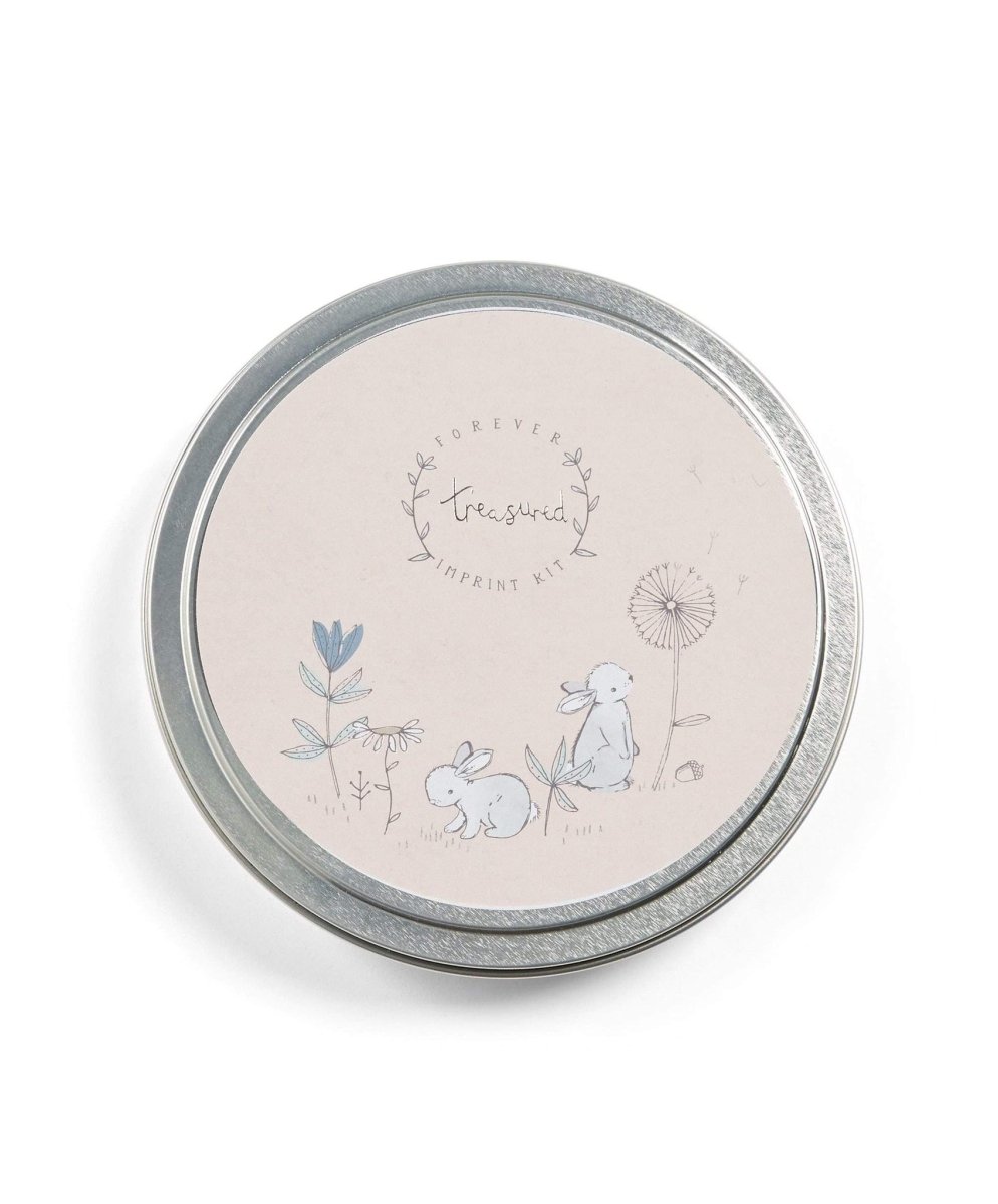 Baby imprint tin lid with floral baby scene and tree graphic
