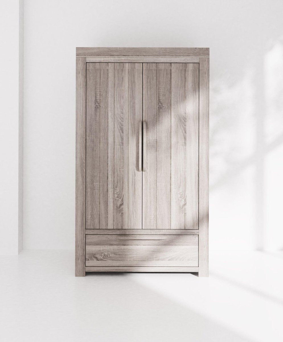 Grey wash nursery wardrobe with two doors and drawer, centered view.