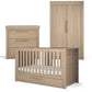 Oak-toned cot bed with slatted ends, matching dresser and double wardrobe