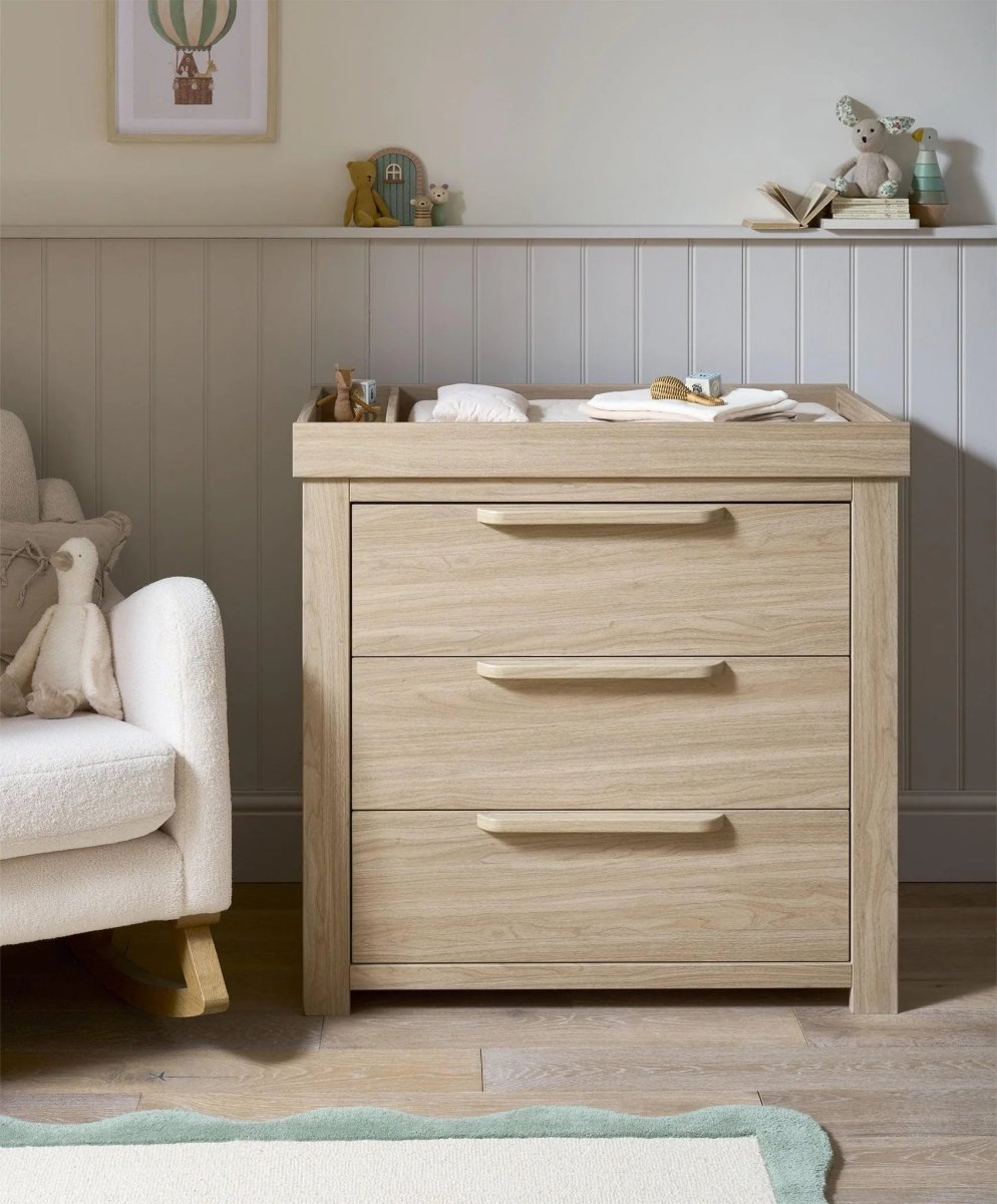 Oak dresser changer with three drawers and long bar pull handles