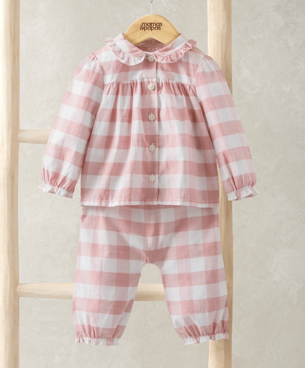 Pink gingham baby pajama set with button front and long sleeves