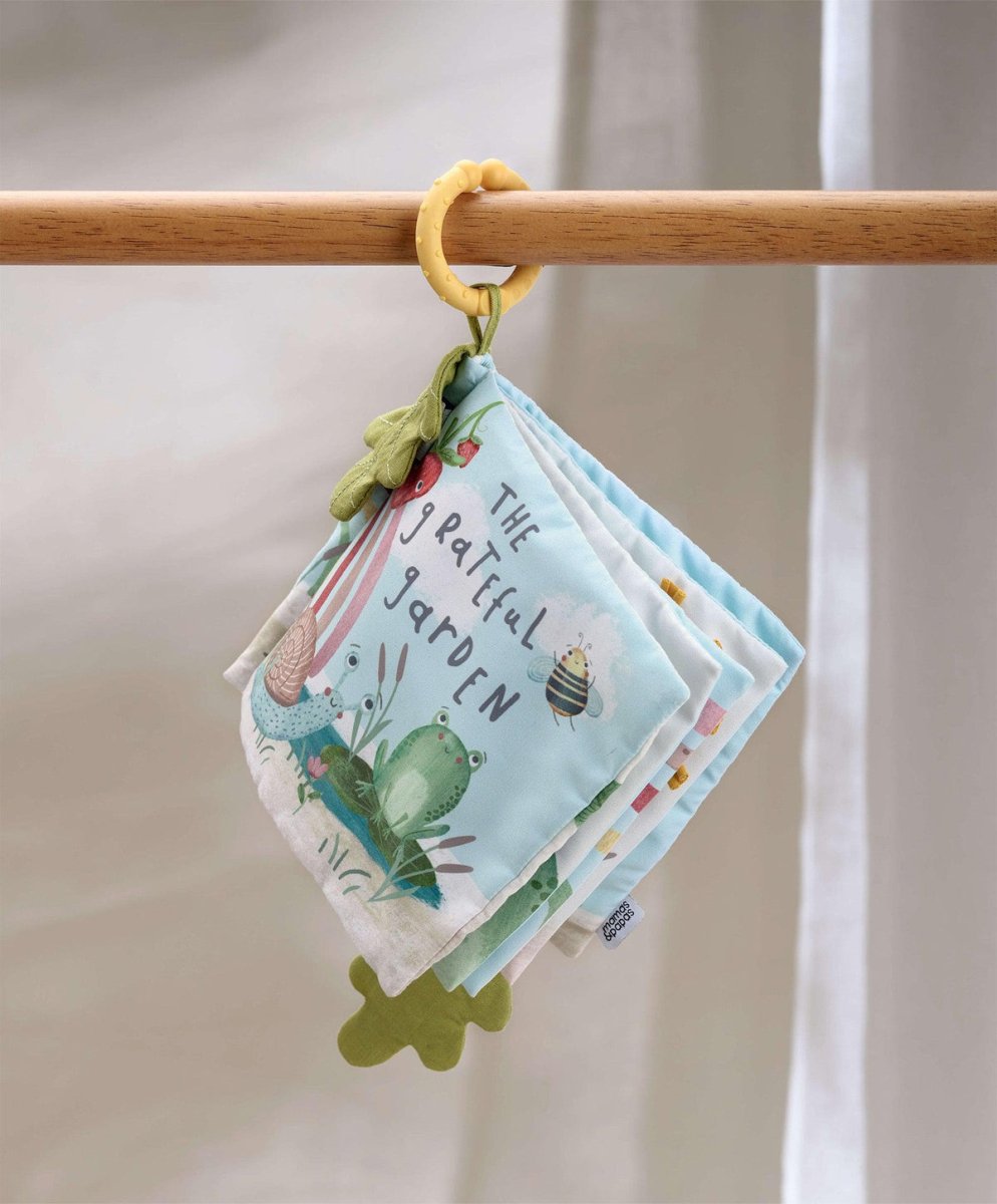Soft fabric activity book with ring handle and leaf; Grateful Garden cover
