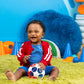 Red, white, and blue rattle soccer ball held by a child