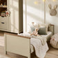 Harwell cotbed - cashmere with wooden rails and white bedding, beige quilt