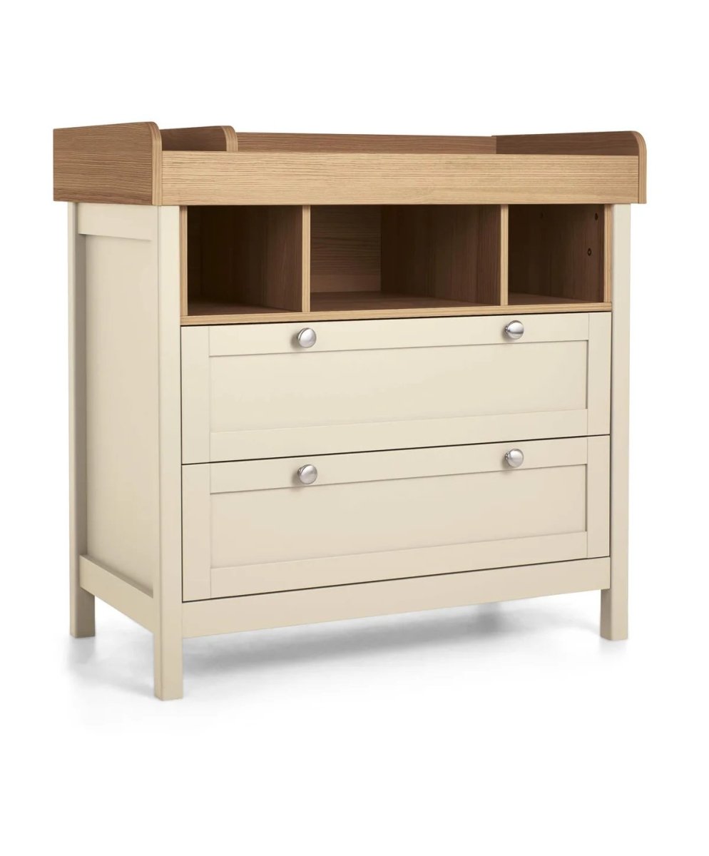 Baby changing dresser with light cream cabinet, wood top, 3 drawers, and open cubbies