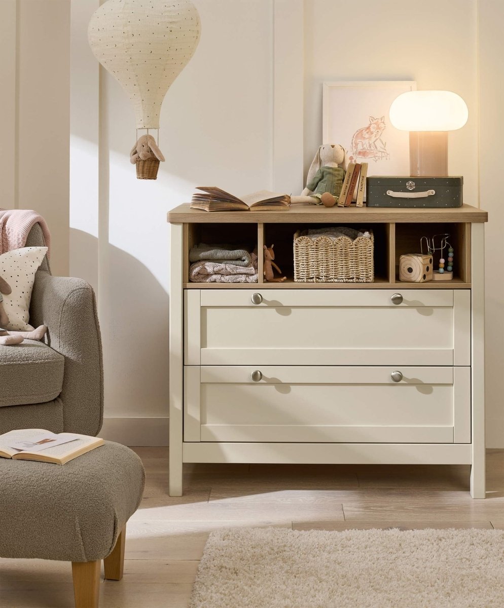Baby dresser changer with open storage and two drawers, light wood and white frame