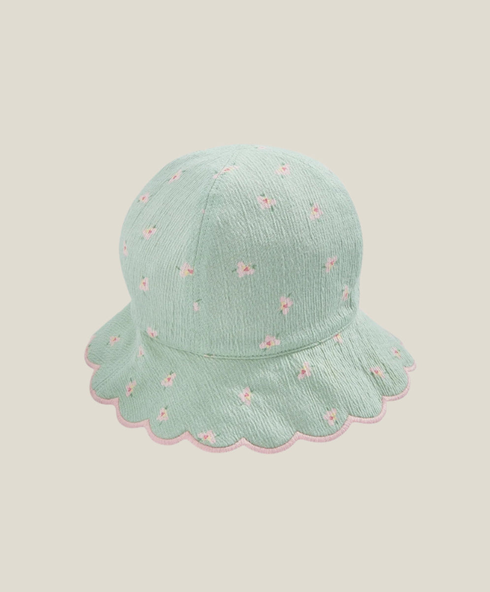 Light blue bucket hat with pink flower print and scalloped brim
