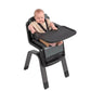 High chair with black tray, gray seat pad, and five-point toddler harness