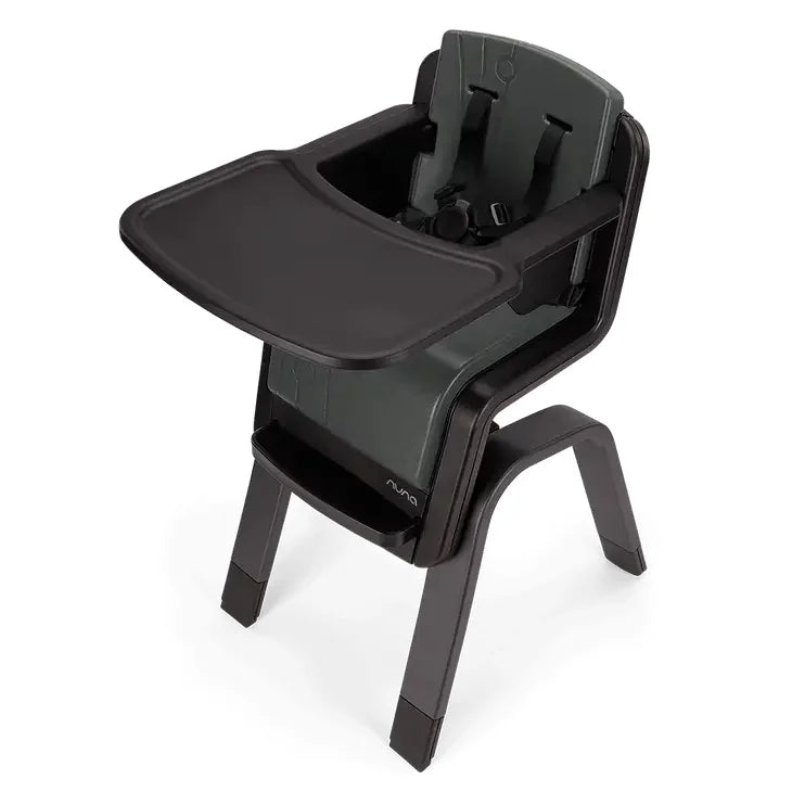 High chair with black tray insert, molded seat, and four-legged base