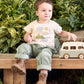 Cream baby T-shirt with playful sun, cloud, and mountain print