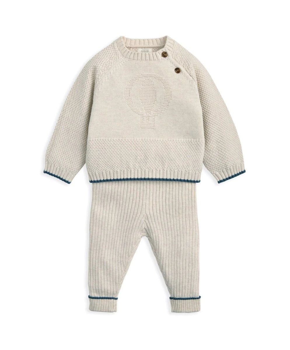 Off-white knitted baby set with sweater and ribbed pants, blue trim cuffs