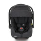 Joie dark gray infant car seat in front view with padded canopy and harness