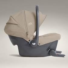 Side view of sandstone group 0+ car seat with canopy and recline base
