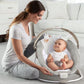 Infant bouncer with grey seat and plush bunny toy arch
