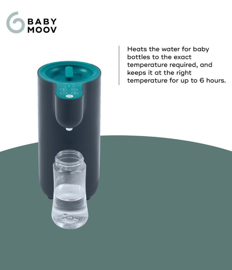Electric baby bottle warmer with teal lid, holding a clear baby bottle.