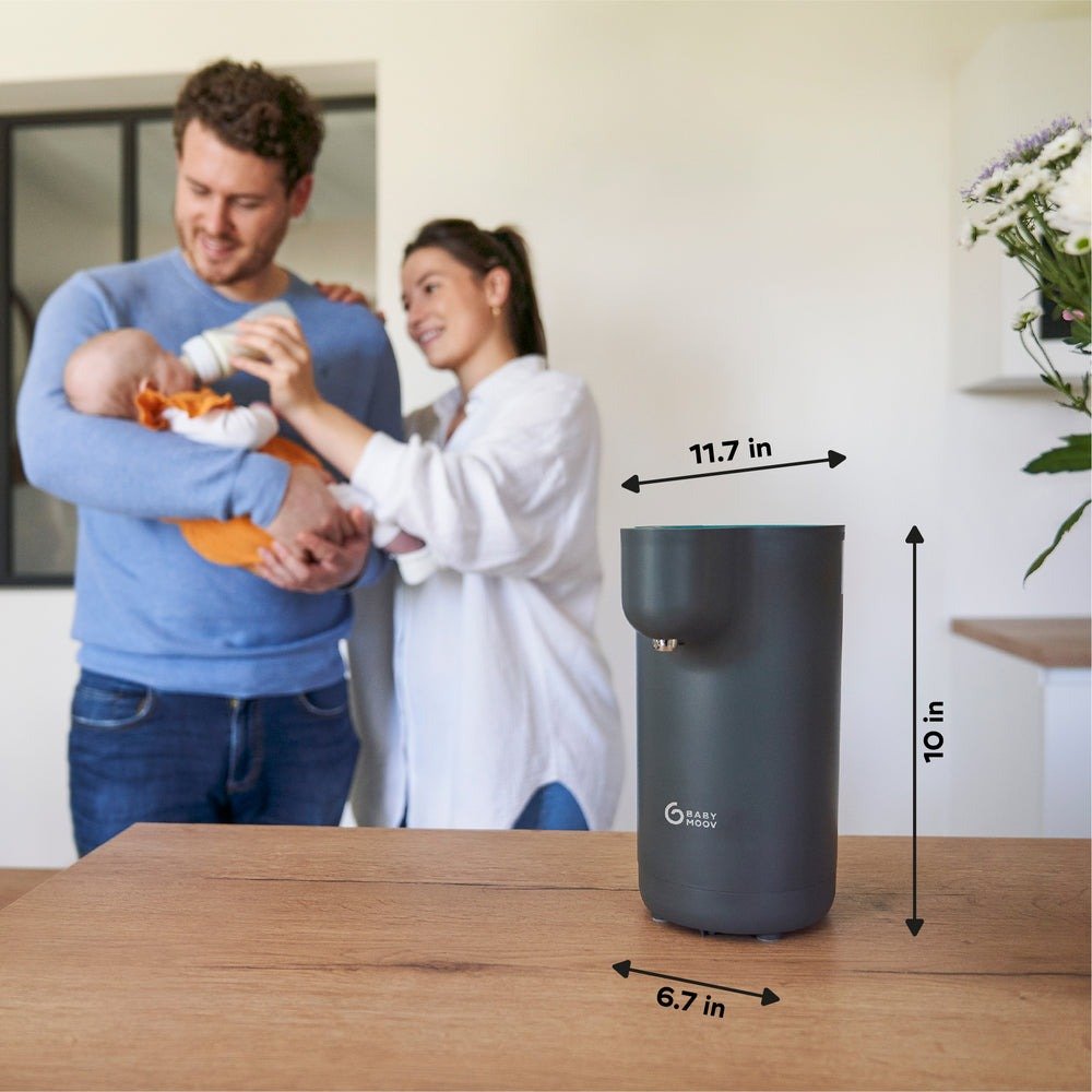 Baby bottle warmer, dark gray body with teal lid, shown with size dimensions.