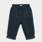 Jersey lined trousers in dark navy, elastic waistband, cuffed cuffs and front crease