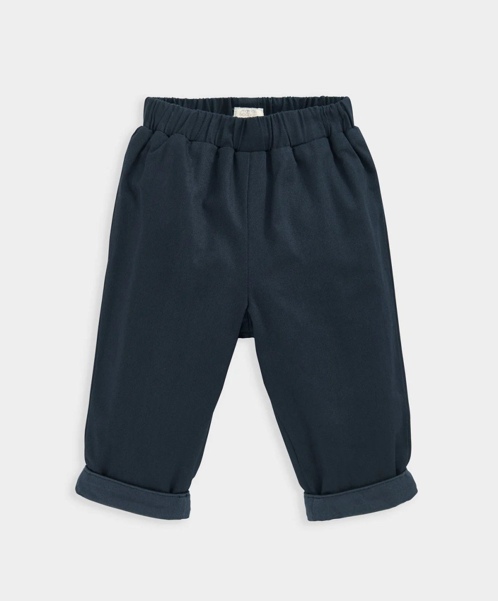 Jersey lined trousers in dark navy, elastic waistband, cuffed cuffs and front crease