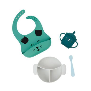 Teal dog-themed baby bib set with matching mask and small accessories