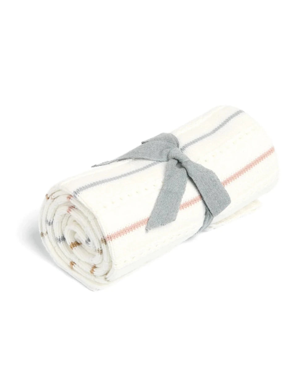 Cream knit blanket roll with thin neutral stripes and gray tie ribbon